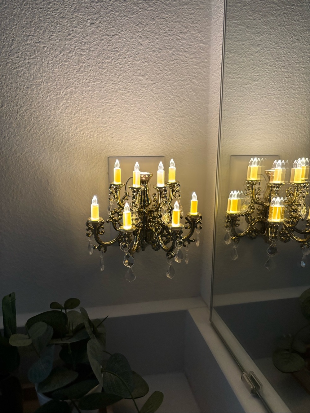 Ornate Gold Wall Sconce with Warm Yellow LED Candles
